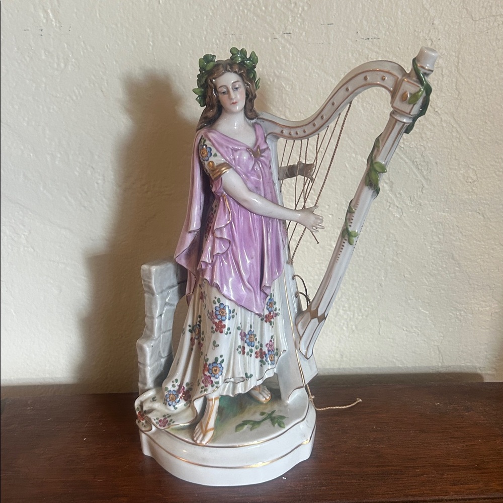 Elegant Porcelain Harpist Figurine in Purple and White